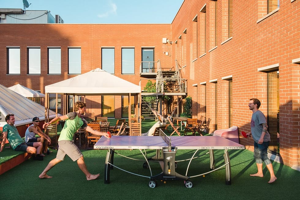 Students play ping pong at Codeworks